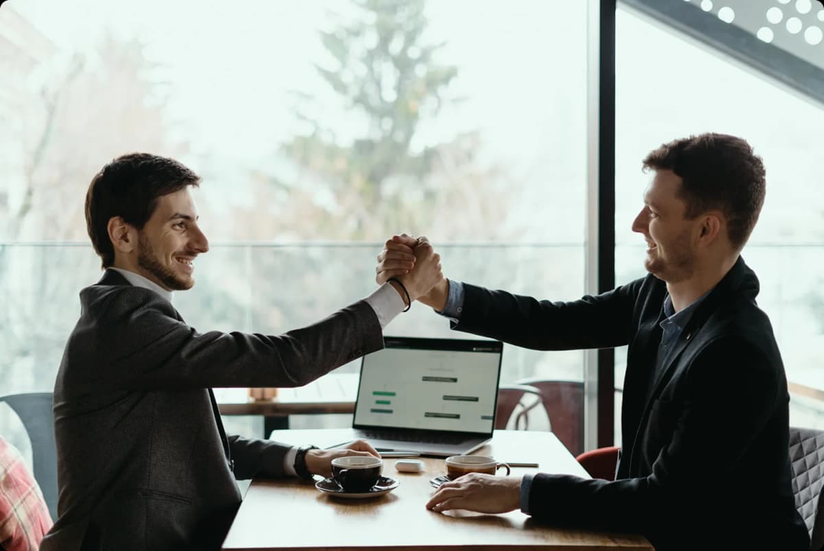 Partnerships - Professional handshake between business people